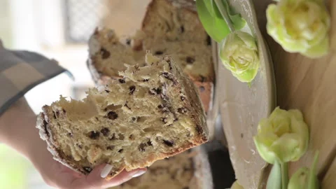 Panettone. Traditional Italian Easter bread with dried berries and chocolate Video stock 267107397