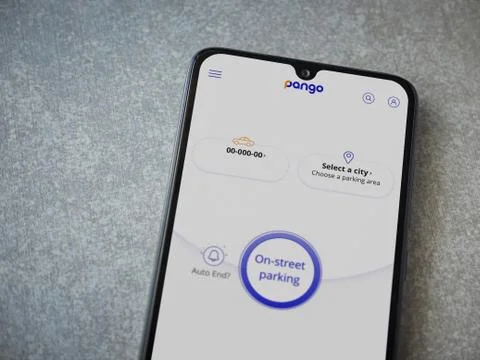 Pango app launch screen with logo on the display of a black mobile smartphone Stock Photos
