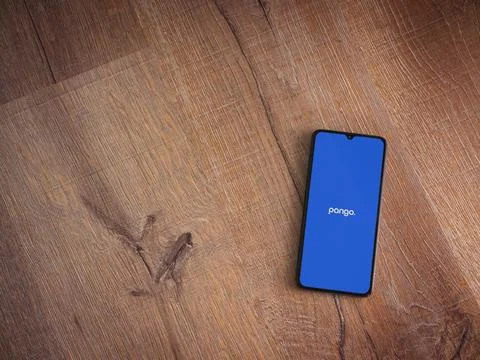 Pango app launch screen on smartphone on wooden background Stock Photos