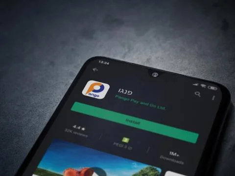 Pango app play store page on the display of a black mobile smartphone on dark Stock Photos