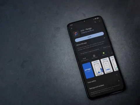 Pango app play store page on smartphone on a dark marble stone background Stock Photos