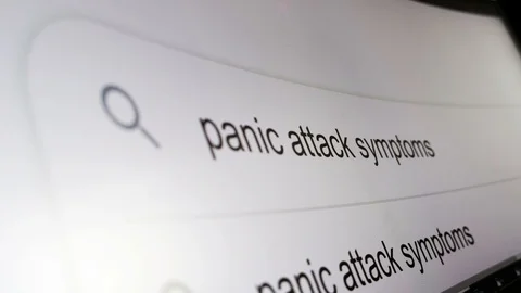 Panic attack symptoms typing on internet search engine anxious people look for Stock Footage 116992008