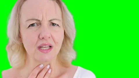 Panic attack woman holds hand on chest touches throat with fingers sore throat Stock Footage 243616935
