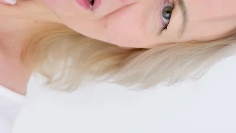 Panic attack woman holds hand on chest touches throat with fingers sore throat Stock Footage 259382697