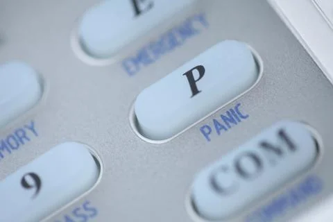 Panic button of an alarm system keypad Stock Photos