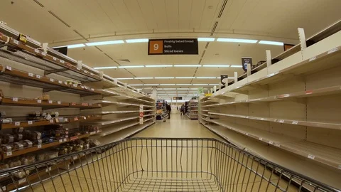 Panic buying: empty shelves in UK supermarket, Winchester, UK March 2020 Stock Footage 126787027