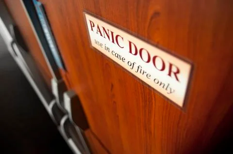 Panic door sign on doors Stock Photos