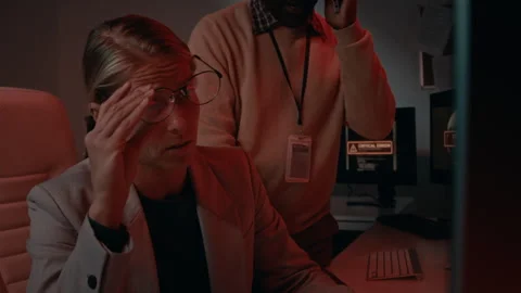 Panicked Female System Administrator Reporting Hacking Attack to Supervisor Stock Footage 288793728