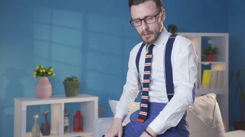 The panicked man is anxious, he does not feel safe, he is depressed. Stock Footage 230934162