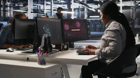 Panicked system administrator in data center reacting to spyware warning Stock Footage 309778040