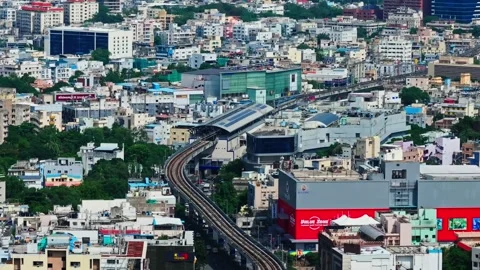 Panjagutta metro station with Train, Next Galleria Mall, Value Zone Hyper Mart Vídeo Stock 344166431