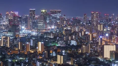 PanLeft Osaka City Night View Timelapse, High Angle Overview and Road Traffic Stock Footage 334557599
