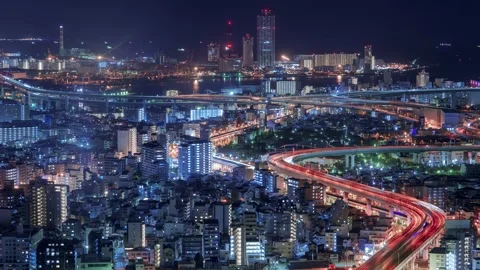 PanLeft Osaka City Night View Timelapse, High Angle Overview and Road Traffic Stock Footage 334557651