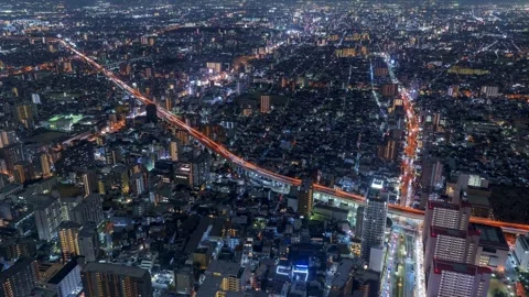 PanLeft Osaka City Night View Timelapse, High Angle Overview and Road Traffic Stock Footage 334557866