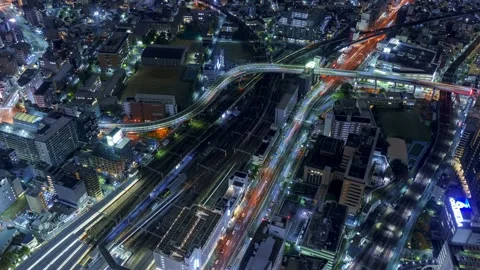 PanLeft Osaka City Night View Timelapse, High Angle Overview and Road Traffic Stock Footage 334557909
