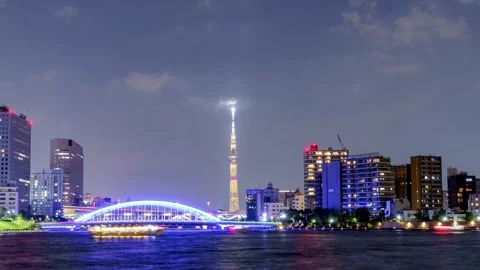 PanLeft Sumida River Night View Timelapse, Tokyo Skytree and River Traffic Stock Footage 334558725