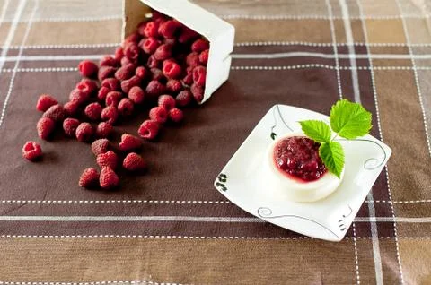 Panna cotta at table Stock Photos
