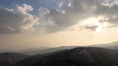 Panning Above the Mountains in Sunset Stock Footage 324562430