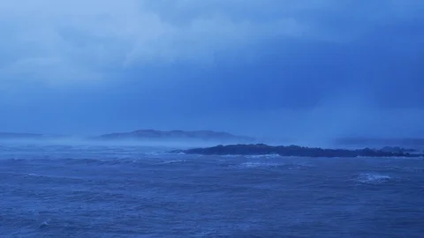 Panning Across Cold Winter Storm Passing Over Ocean In Iceland 1 Vídeo Stock 87490868