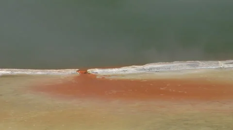 Panning across edge of hot pool Stock Footage 4904643