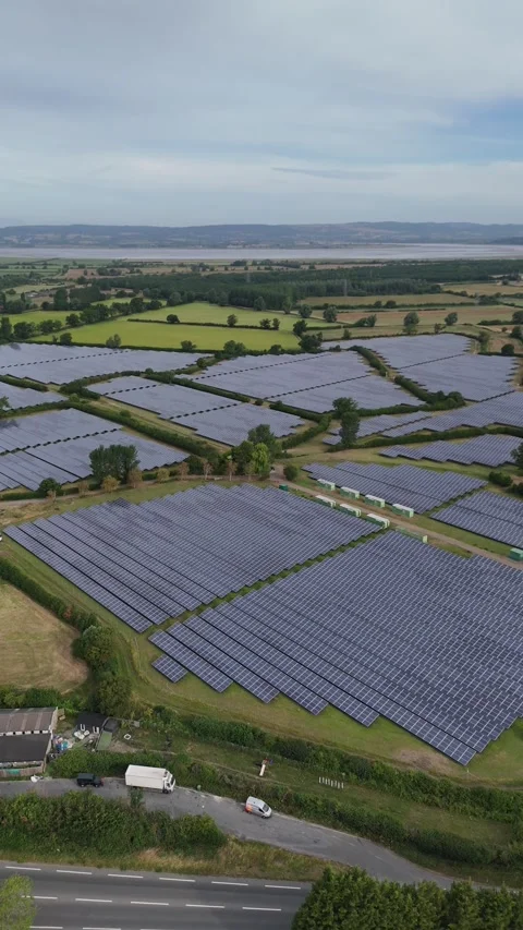 Panning across the full extent of a solar farm, Gloucestershire. Stock Footage 326645878