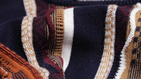 Panning Across Patterned Knit Sweater Fabric for Fashion Retail Stock Footage 341706521