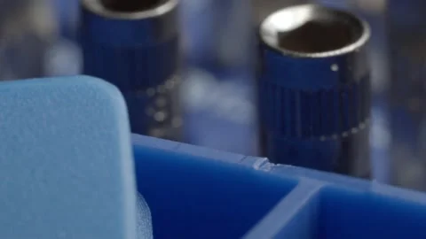 Panning Across Precision Screwdriver Bits and Socket Tools in Macro Closeup Stock Footage 340806588