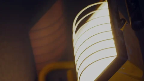 Panning across a work Light, Tugsten double reflection Stock Footage 165111195