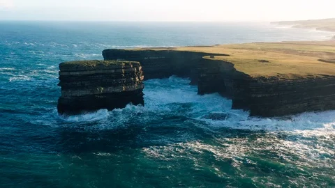 Panning Aerial of the Coast at Downpatrick Head, Ireland Stock Footage 123446009