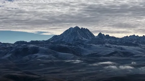 Panning Aerial Hyperlapse of Yala Snow Mountain in Morning Light Sichuan, China Stock Footage 320352162