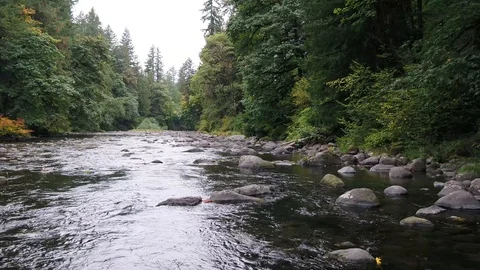 Panning Aerial of River &amp; Rocks Stock Footage 97186955