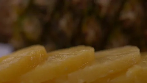 Panning and Close Up of Pineapple Slices Stock Footage 130450849