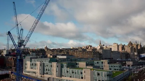 Panning and Tilting Time Lapse of Waverley Station and Edinburgh Stock Footage 78546823