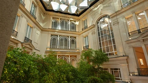 Panning Apple Store Champs-Elysees iconic store Paris interior design Stock Footage 105485980