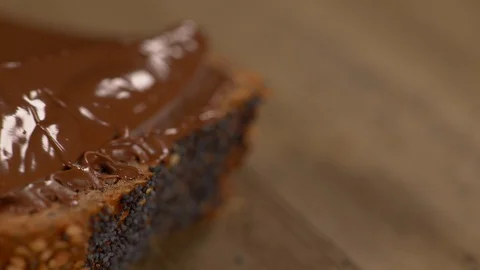 Panning of Applying Chocolate Spread on Multi Grain Loaf Of Bread with Seeds Video stock 130126259