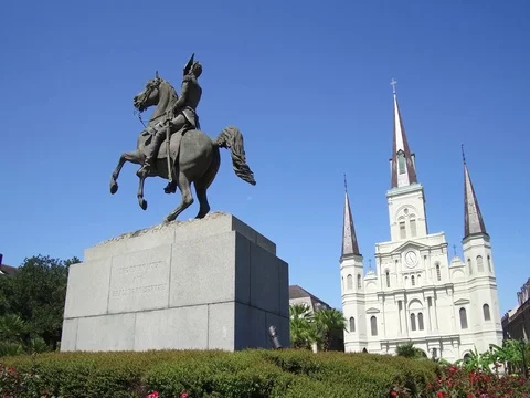 Panning around the Andrew Jackson statue and St. Louis Cathedral in New Orleans Stock Footage 81167950