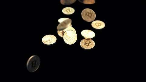 Panning around of falling Bitcoins Stock Footage 77514775