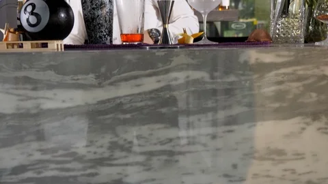 Panning up on bartender working at his bar Stock-Footage 96024919
