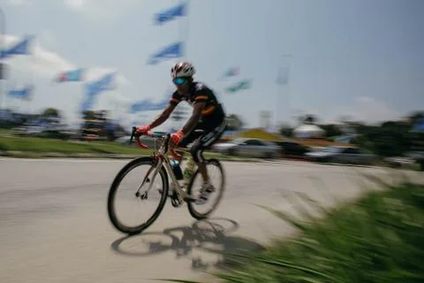 Panning blurred of cyclist Stock Photos