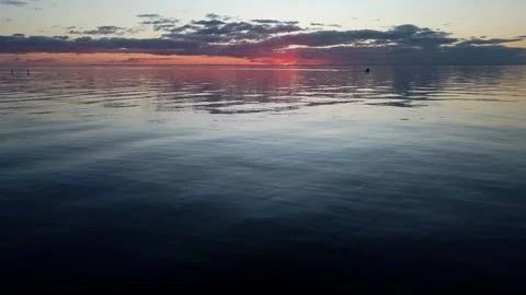 Panning Up to Boat at Sunset Stock Footage 286296930