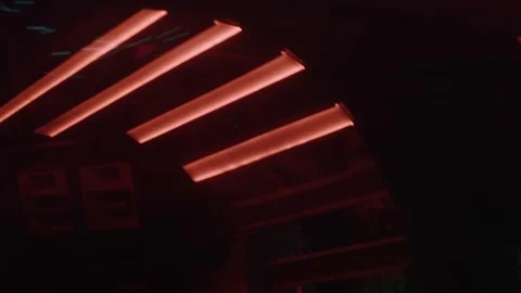 Panning camera over LED light show elements in Berlin Techno club Stock Footage