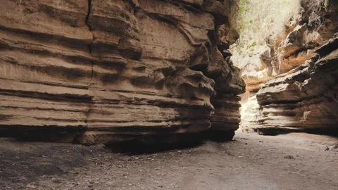 Panning In A Canyon Wavy And Smooth Stone Walls Turned By Water Stockbeeldmateriaal 97974738