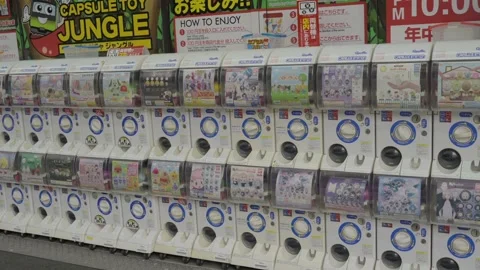 Panning capsule toy vending machine japan Stock Footage 222445713