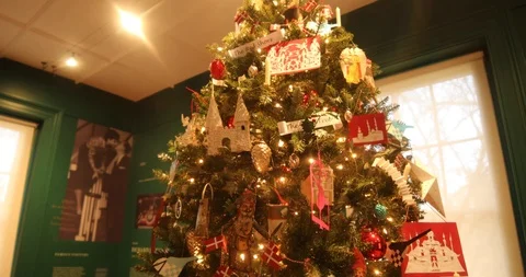 Panning a Christmas Tree with Hand-made Paper Ornaments Stock Footage 121541723