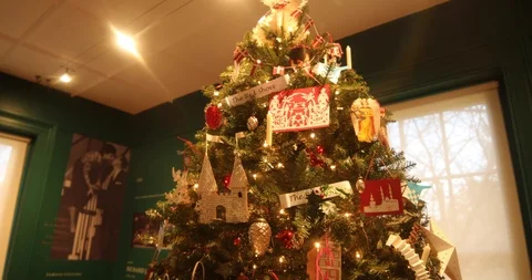 Panning a Christmas Tree with Hand-made Paper Ornaments Stock Footage 121541738