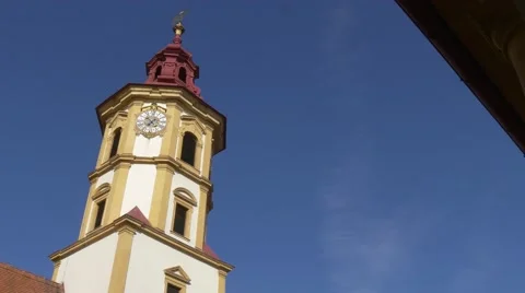 Panning from clock tower to yard inside Eggenberg Palace, Graz, Austria Stock Footage 56840520