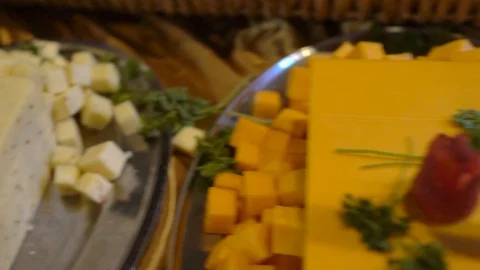 Panning closeup cheese spread at buffet Stock Footage 126017176