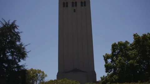 Panning up a college campus tower Stock Footage 103869233