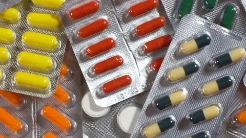 Panning colored blisters top view. To be healthy. The man fell ill. Stock Footage 73034104