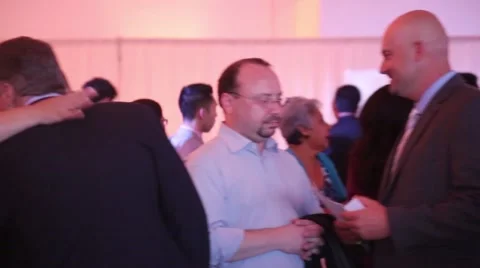 Panning crowd shot at gala evening event Stock Footage 46035958